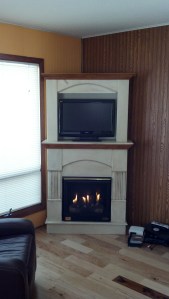 fireplace surround made to match the cabinets